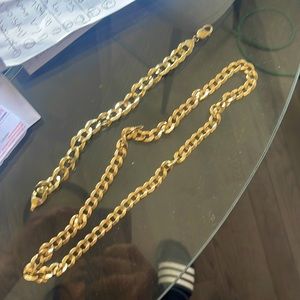 14 kt solid gold bracelet and chain bracelet is 50 grams and chain is 100 grams